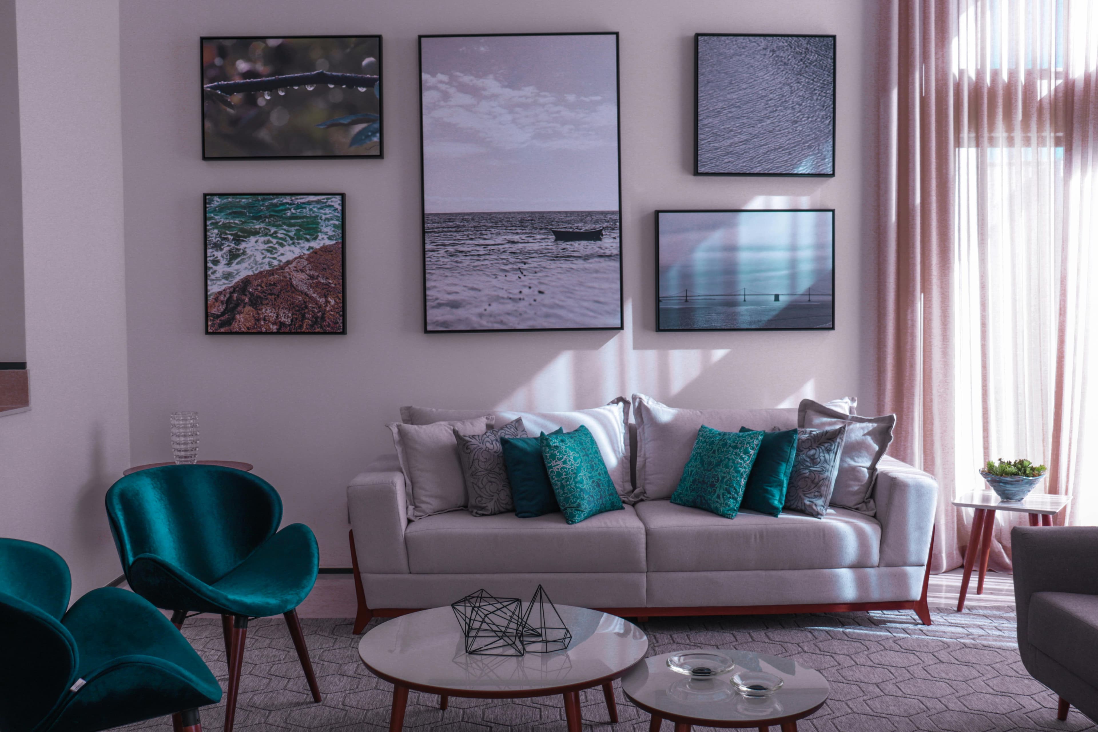Contemporary living room with coastal teal accents