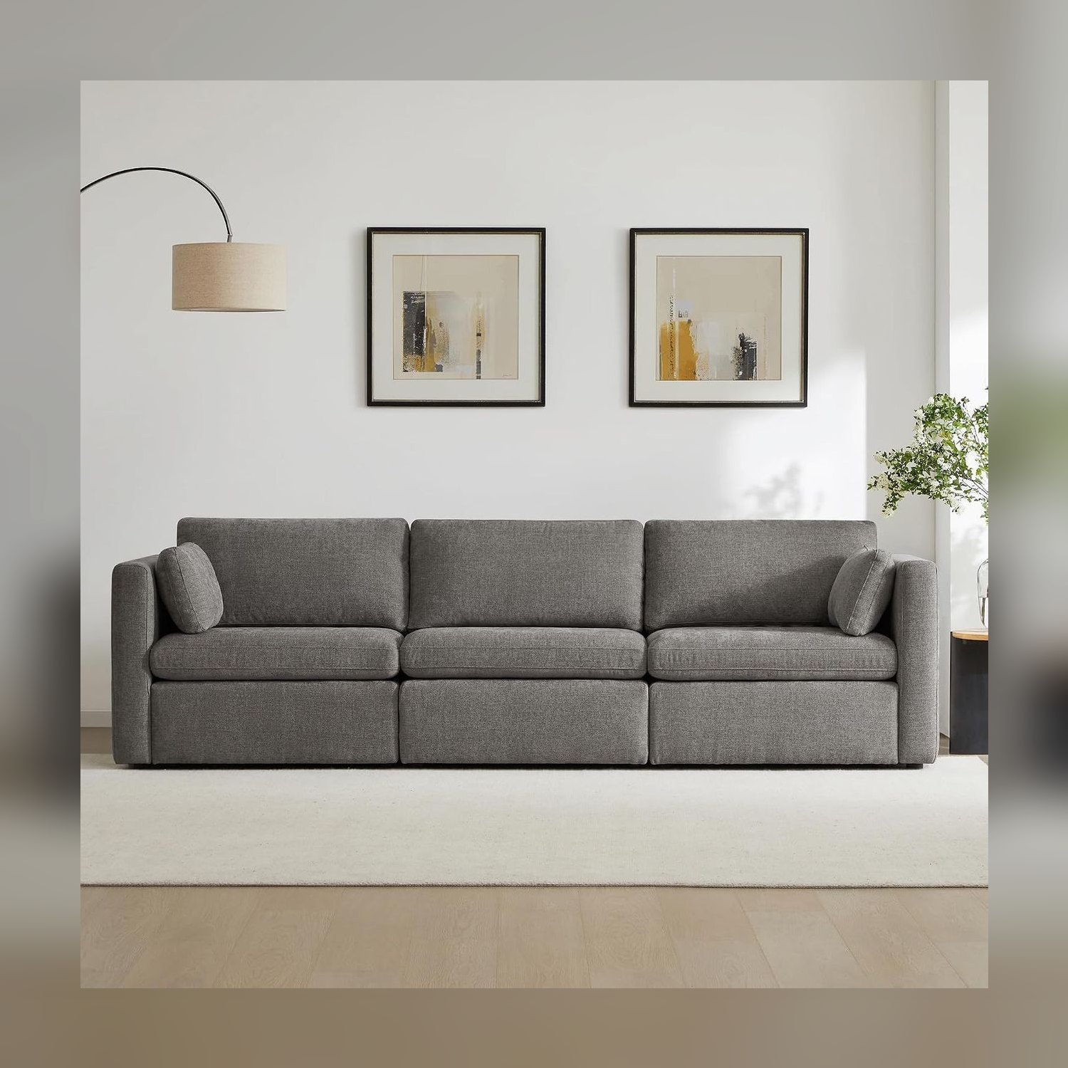 CHITA gray three-seat modular sofa with slim track arms in a bright living room